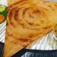 Milagai Podi Masala Dosa · Thin rice and lentil crepe filled with a mixture of grounded dry spices containing dry chili...