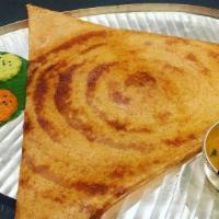 Cheese Masala Dosa · Thin rice and lentil crepe filled with grated cheddar cheese and potatoes and onion. Served ...