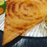 Milagai Podi Dosa · Thin rice and lentil crepe filled with a mixture of ground dry spices containing dry chilies...
