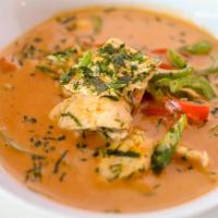 Panang Curry · Spicy. Prepared with Panang curry paste, bell pepper, coconut
milk and garnished with kaffir...