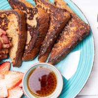 French Toast  · Thick sliced challah with butter and maple syrup