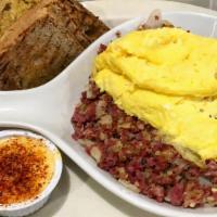Corned Beef Hash · with scrambled eggs, potatoes  and Toast with choice of   coffee or tea