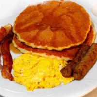Pancakes · With eggs, Beef bacon and Turkey sausage and toast with choice of   coffee or tea