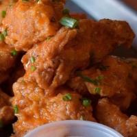 Boneless Wings · Crispy Buttermilk fried boneless tenders tossed in your choice house made sauces; Hot & Smok...