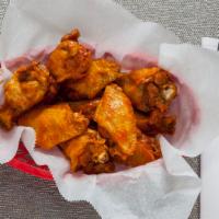 Authentic Wings Basket · Includes nine wings with french fries and drink.