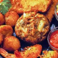 Ultimate Seafood Platter · 3 pcs Whiting
3 Fried Shrimp
3 Steamed Shrimps
3 fried Scallops 
And 1 Crab cake