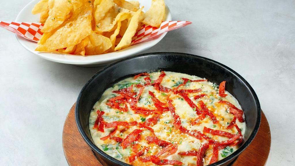Spinach Artichoke Dip · Mozzarella and Parmesan cheese, fresh spinach, artichokes and crispy pepperoni.. Served with crispy pasta chips.