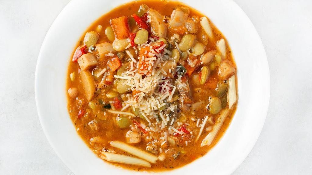 Minestrone Soup · Our signature tomato soup with hearty vegetables, beans, and pasta.