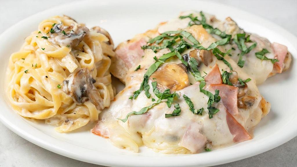 Chicken Milano · Sautéed chicken breast with mushrooms and Alfredo sauce topped with ham, Provolone cheese and basil. Served with fettuccine.
