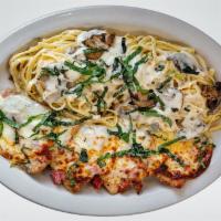 Chicken Milano Family Platter · Sauteed chicken breast with mushrooms and Alfredo sauce layered with ham, basil and provolon...