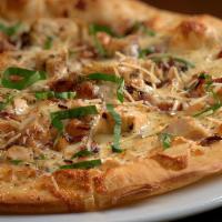 Great White Pizza · House-made pizza crust with a mascarpone cheese base baked with artichokes, mozzarella, nusk...