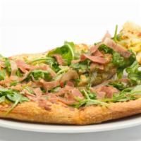 Prosciutto Pizza · House-made pizza crust with a mascarpone and roasted garlic base baked with artichoke and mo...