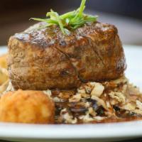 Beef Tenderloin · 8-9 ounce center cut tenderloin topped with a balsamic glaze served on a bed of napa cabbage...