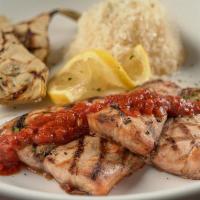 Red Fish · Oak grilled redfish topped with fra diavolo sauce served with steamed mascarpone basmati ric...