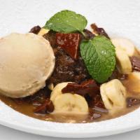 Toffee Banana Bread Pudding · Warm banana bread pudding served with our house-made toffee, fresh banana slices and a rum-c...
