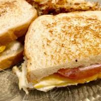 Egg And Cheese Sandwich · With choice of meat for an additional charge.