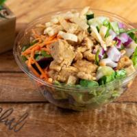 Asian Crunch Salad · Choice of greens, teriyaki chicken, cucumbers, onions, shredded carrots, edamame, wonton str...
