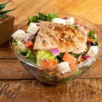 Alaskan Salmon Salad · Choice of greens, salmon, tomatoes, onions, carrots, feta cheese, sunflower seeds, old bay s...
