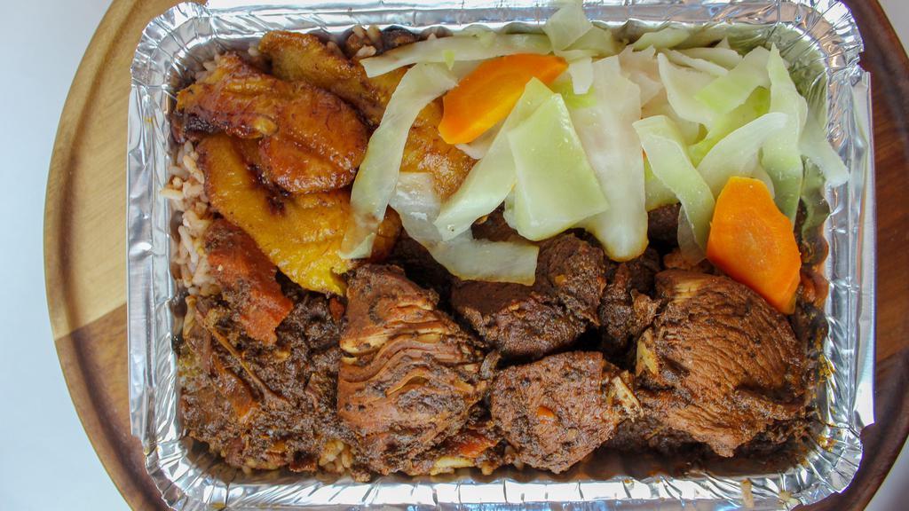 Brown Stew Chicken · Chicken browned and simmered in a rich flavored gravy. served.
