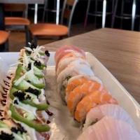 Sushi & Sashimi Combo · 8 pieces of assorted Nigiri &  Each 2 pieces of Salmon, Tuna, Yellowtail, White Tuna Sashimi...