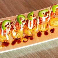 Crispy Spicy Tuna · Deep fried rice with spicy tuna on top with spicy mayo and eel sauce