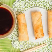 Veg. Spring Roll · Deep-fried vegetable spring roll served with duck sauce.