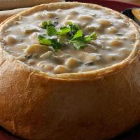 C - White Bean Chicken Chili · Slow-simmered chicken and white beans in
a roux-thickened chicken stock with tangy
sour crea...