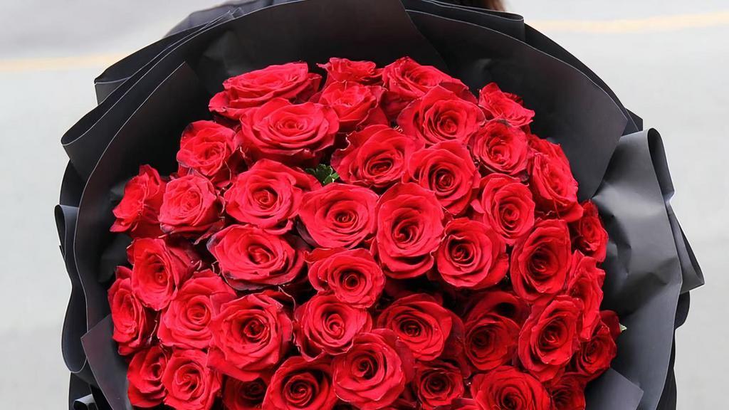 2 Dozen Red Roses  · Big bright bouquet of 2 dozen Red roses. Comes with a vase