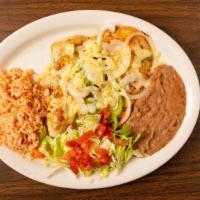 Pollo Monterey Especialidad · Marinated chicken breast. Topped with Monterey Jack. Served with refried beans, rice, and yo...