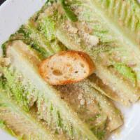 Caesar Salad · Our house Caesar salad with romaine lettuce, Parmesan cheese, croutons and our house Caesar ...