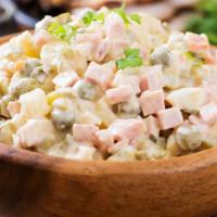 Olivier With Mortadella 1 Lb · Russian potato salad 
Ingredients: mortadella, potatos, carrot, eggs, peas, mayo, salt, pepp...