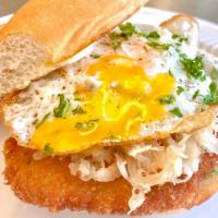 Ernst · Pan Fried Pork Schnitzel W/ Sauerkraut, Onion, Dijon Aioli, Fried Egg on a Toasted Bolillo B...