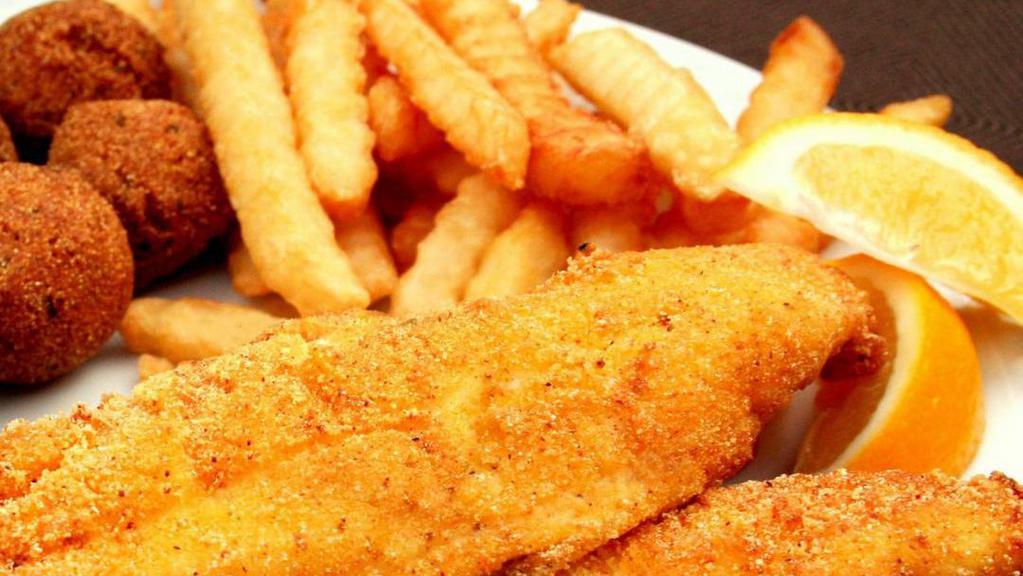 Fried Fish · Two Large Pieces of Hot and Delicious Fish,
Five Tasty Hush Puppies,
A Huge Helping of French Fries,
Tater Tots,
Bread,
Lg Lemon Wedge.
Be Advised, Fish May Contain Bones.