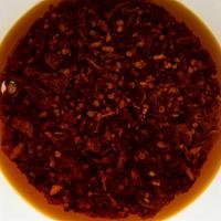 Spicy Chili Oil (Small) · Homemade condiment with crunchy bits of garlic and shallot (8 fl oz)