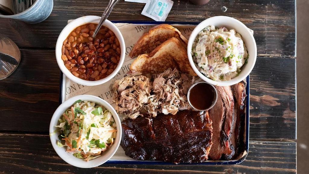 Meat Madness Platter · baby back ribs | pulled chicken | pulled pork | rib tips | brisket | your choice of three family- style sides | texas toast