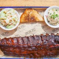 Full Rack Baby Back Ribs · dry rubbed | hickory smoked | served with your choice of two sides and texas toast