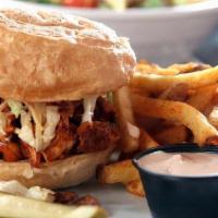 Pulled Chicken Sammie - Delivery · slaw | toasted brioche bun | served with hand-cut kennebec fries, smoked tomato aioli & hous...