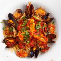 Linguine Di Mare · Linguine pasta with mussels, clams and jumbo shrimp in a white wine or tomato sauce.