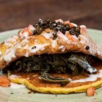 Fried Catfish · 10 oz. Fried catfish fillet, capers, collard greens, herb grits, tomato coulis sauce (Gluten...