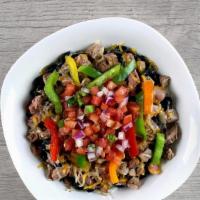 Fajita Steak Bowl Large · Diced sirloin, black beans, bell peppers, and converted rice layered together and topped wit...