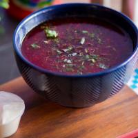 Borscht · Delicious Ukrainian borscht soup made with fresh red beets, grass fed beef, onions, carrots,...