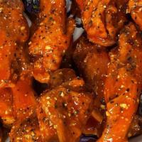 50 Pc Wings · Choose up to 2 flavors