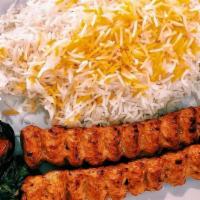 Luleh Kebab (Koobideh) · Ground prime filet mignon, skewered and charbroiled to perfection.