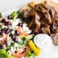 Original Gyro Plate · Beef and lamb meat shaved off of a vertical rotisserie. Served with a side greek salad, pita...