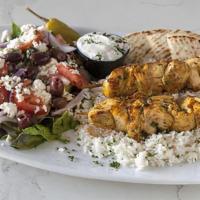 Chicken Souvlaki Plate · Two skewers of our marinated grilled chicken, char-grilled. Served with our lemon rice, gree...
