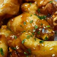 Party Jumbo Wings · Party Jumbo Wings tossed in one of our house made sauces served with buttermilk ranch or blu...