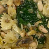 Vegan Veggie Bowtie · Vegan. Bow tie pasta sautéed with garlic, zucchini, mushrooms, spinach, white beans & tomato...