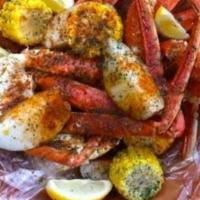Snow Crab Legs · Succulent snow crab legs with butter corn and potatoes. (Price per lb)
