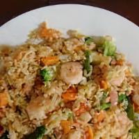 Home Made Fried Rice · Fried Rice with shito(black pepper) served with protein option choices of fried fish, fried ...