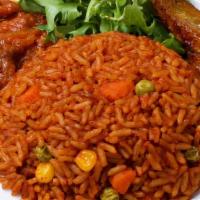 Jolloff Rice · With tomatoes stew served with choice of fish, meat or chicken or a mixture of all three opt...